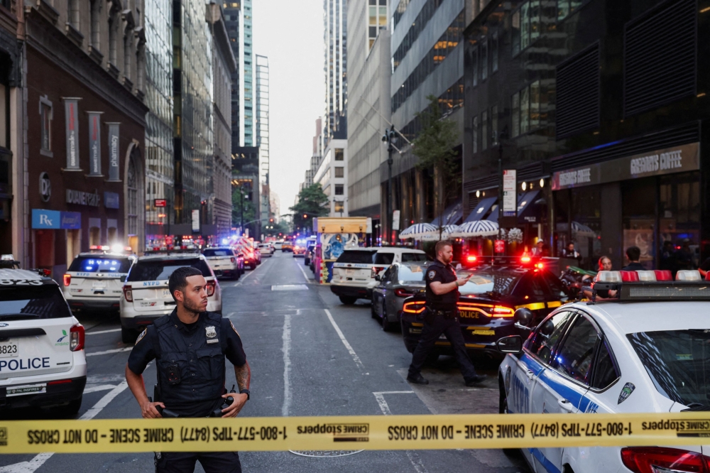 A police officer stands guard in a cordoned off area during a reported active shooter situation in the Manhattan borough of New York City, July 28, 2025. — Reuters pic 