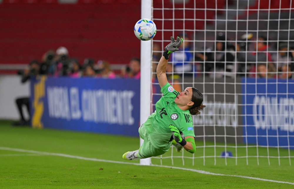 Colombia’s goalkeeper Katherine Tapia stops a penalty during the penalty shootout of the Women’s Copa America 2025 semifinal football match between Argentina and Colombia at the Rodrigo Paz Delgado Stadium in Quito on July 28, 2025. — AFP pic 