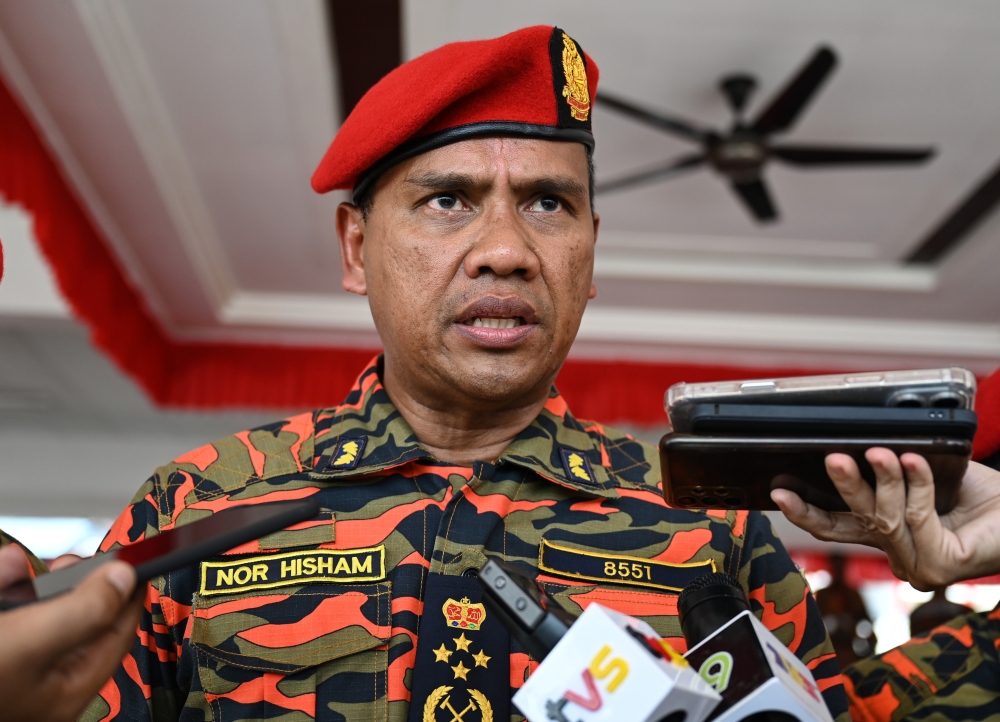 JBPM director-general Datuk Nor Hisham Mohamad speaks to reporters at the National Firefighter Drill 2025 at the Bomba Academy in Wakaf Tapai, Marang in Terengganu on July 29, 2025. — Bernama pic