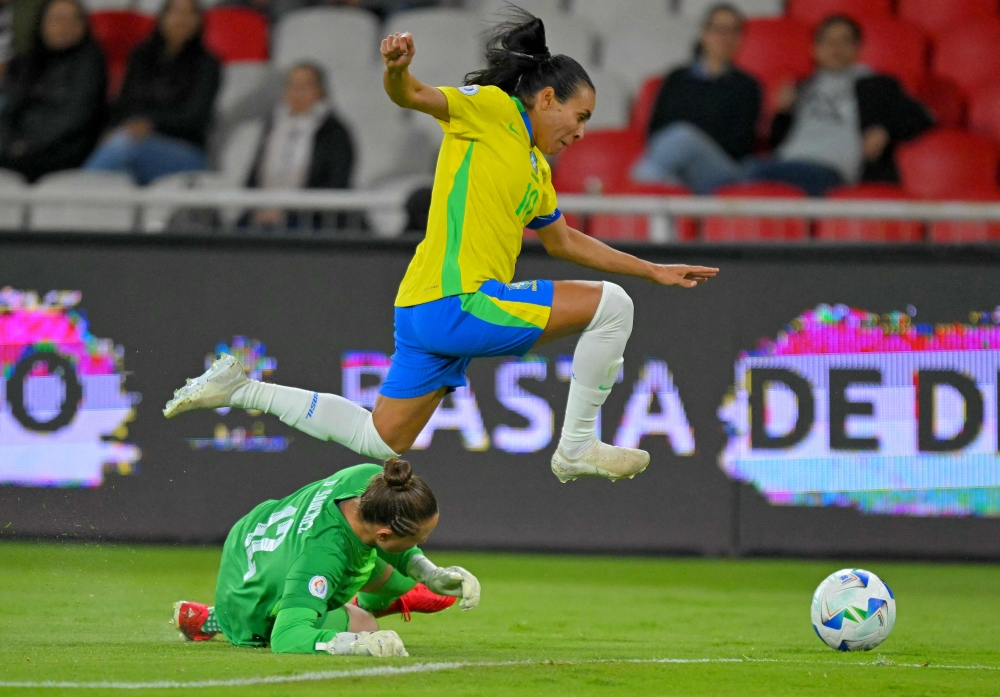 Brazil’s forward #10 Marta evades Uruguay’s goalkeeper #12 Agustina Sanchez during the Women’s Copa America 2025 semifinal football match between Brazil and Uruguay at the Rodrigo Paz Delgado Stadium in Quito on July 29, 2025. — AFP pic 