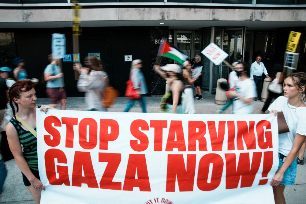 Demonstrators gather outside the UN Headquarters during a ‘Stop Starving Gaza’ protest in New York City, July 29, 2025. — Reuters pic 