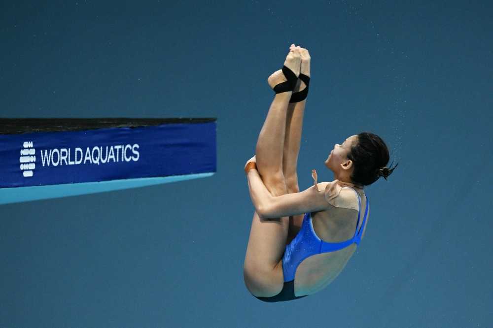 Malaysian diver Datuk Pandelela Rinong has to sit out the individual 10m platform event due to her shoulder injury after competing in the final of the mixed team 3m and 10m diving event during the 2025 World Aquatics Championships in Singapore July 26, 2025. — AFP pic