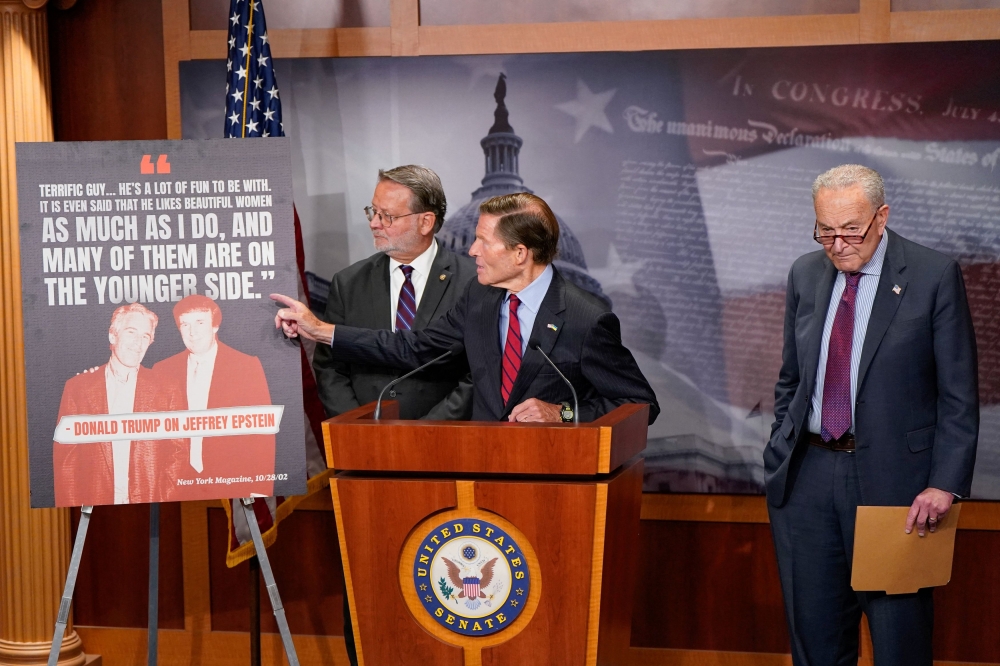 US Senator Richard Blumenthal (D-CT) points to a graphic during a press conference regarding a federal law invoked by Senate Democrats to compel the Trump administration to release files on disgraced financier and sex offender Jeffrey Epstein, on Capitol Hill in Washington, DC, July 30, 2025. — Reuters pic 