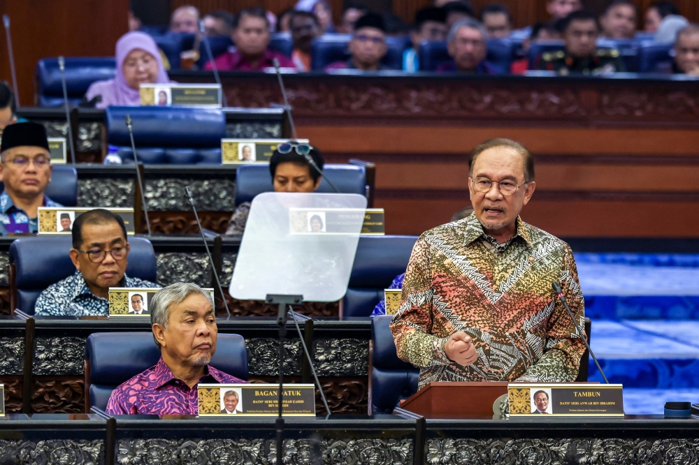 Prime Minister Datuk Seri Anwar Ibrahim tables the 13th Malaysia Plan (13MP) in the Dewan Rakyat at Parliament in Kuala Lumpur on July 31, 2025. — Bernama pic