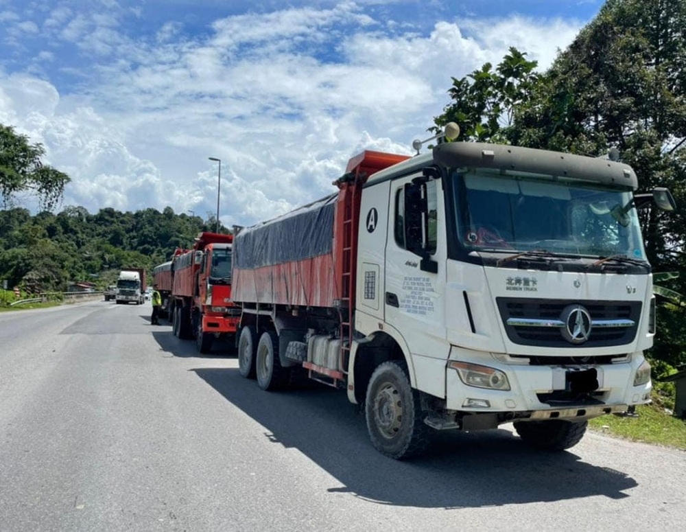 File photo of JPJ Sarawak checking some lorries along Jalan Kuching-Bau. — The Borneo Post pic 