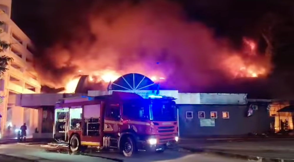 The Kota Kinabalu Community Hall, a post-World War II landmark built in 1958, was nearly destroyed in the fire that started just after midnight on July 29. — Screengrab from Facebook video