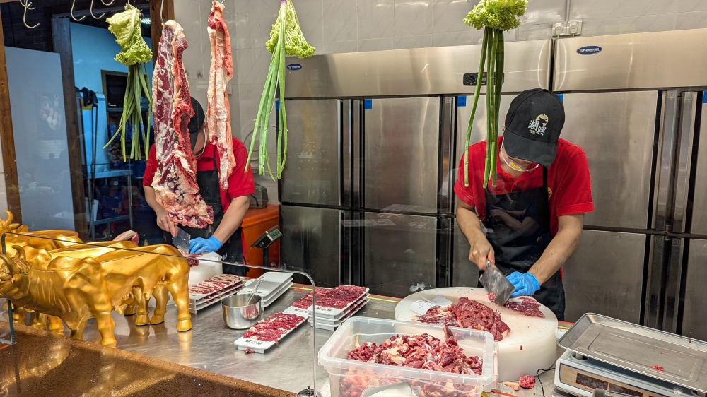 Cuts are prepared and sliced to order in full view of the diners. — Picture by Ethan Lau