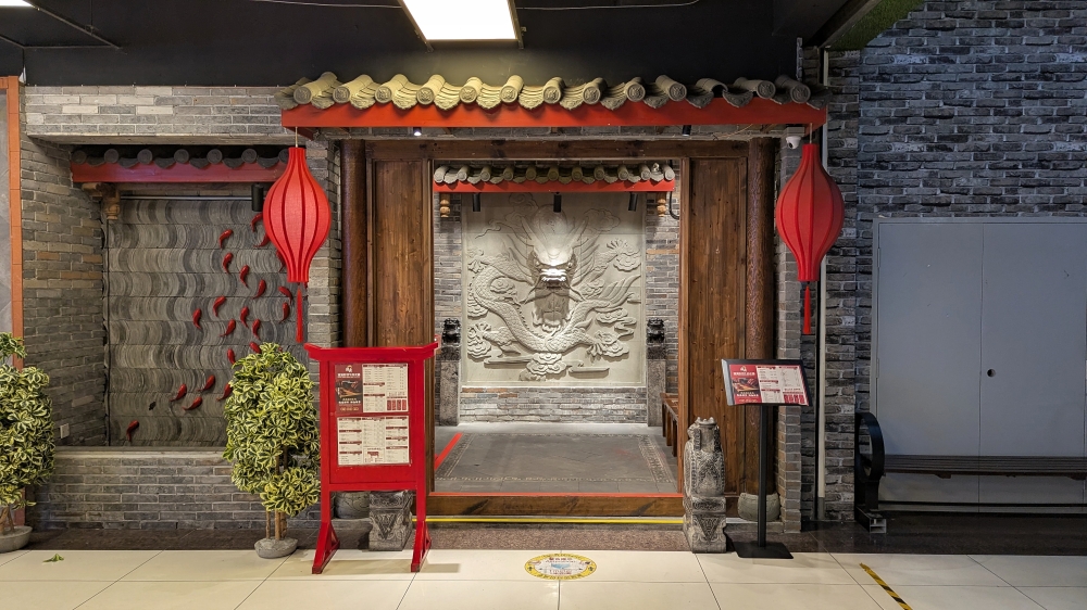 The restaurant is located right next to the main entrance of the mall. — Picture by Ethan Lau