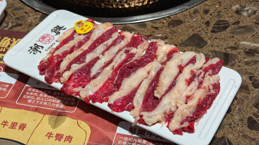 Each cut comes with a card telling you how long it should be cooked for; this should be for 10 seconds. — Picture by Ethan Lau