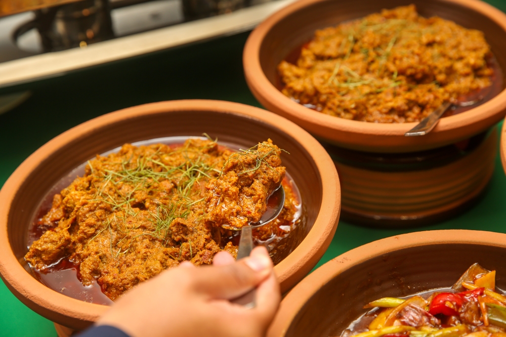 ‘Rendang daging’ is a dish that is served at every Malay celebration. — Picture by Choo Choy May