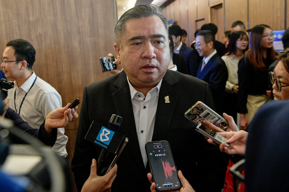 Transport Minister Anthony Loke speaks to the press after the official launch of the Asean-China International Rail Transit Forum 2025 today. — Bernama pic