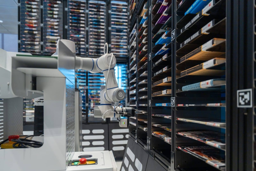 A robotic arm retrieves a selected title at the ‘Star Wars’ pop-up library’s automated book system. — Picture via Facebook/Cher Pong Ng