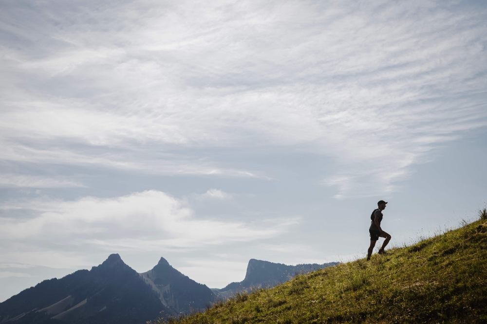 Avid hiker and creator of  ‘Mountain Tinder’, Thibaud Monney, 29 hikes above Bulle in the Fribourg Pre-Alps July 19, 2025. — AFP pic 