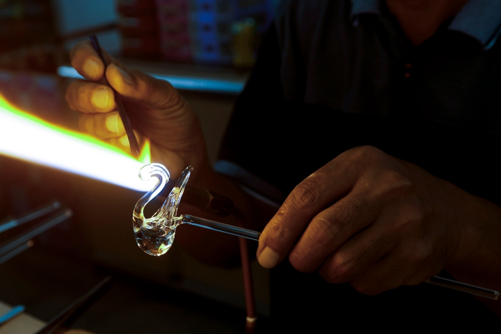 After nearly 40 years of his involvement in preserving this heritage craft, the father of three now wears a proud smile as his delicate glass carvings, which he produces under his brand Kumin Kraf, are popular among local and international art enthusiasts. — Bernama pic