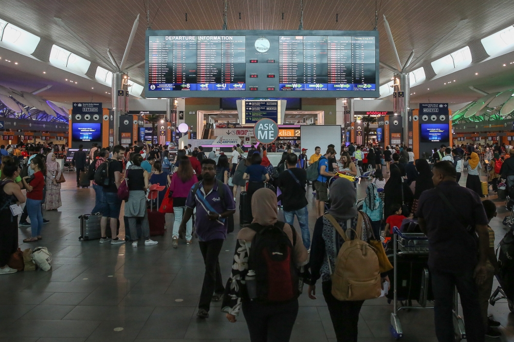 A total of 21 foreigners were denied entry into Malaysia, while another was arrested after AKPS at KLIA foiled attempts to enter and exit the country illegally using three different modus operandi at Terminal 2 (T2). — Picture by Yusof Mat Isa