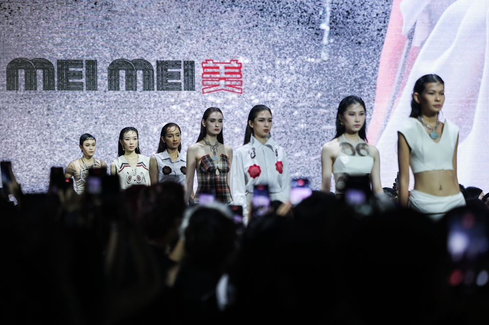 Models wearing Mei Mei’s designs at KLFW 2025, featuring upcycled materials such as worn curtains, old bed sheets and used leather bags in the AirAsia Presents Design to Sustain segment. — Bernama pic