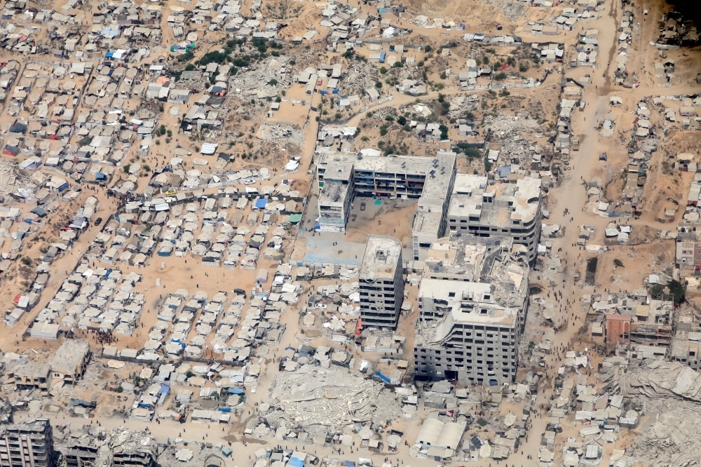 An aerial view from a Jordanian military aircraft shows the Gaza Strip on August 9, 2025, before humanitarian aid is airdropped. — Reuters pic