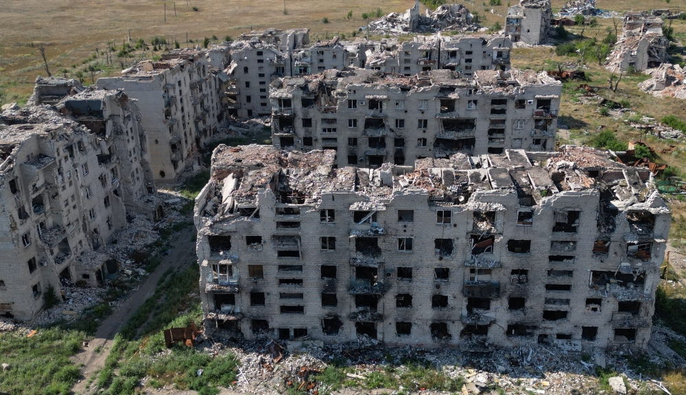A drone view shows the ruins of residential buildings in the abandoned town of Marinka, Donetsk region, on August 7, 2025. — Reuters pic
