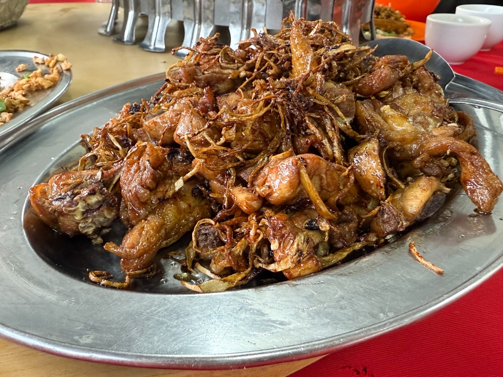 Sesame Ginger Chicken is best relished slowly piece by piece as the chicken has absorbed the sauce together with the ginger shreds. — Picture by Lee Khang Yi