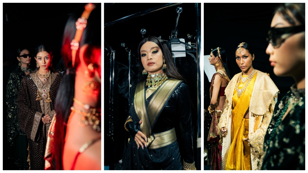 The show opened with singer Mimifly’s (centre) stirring performance of “Angkat”, setting the tone for a series of striking black ensembles.