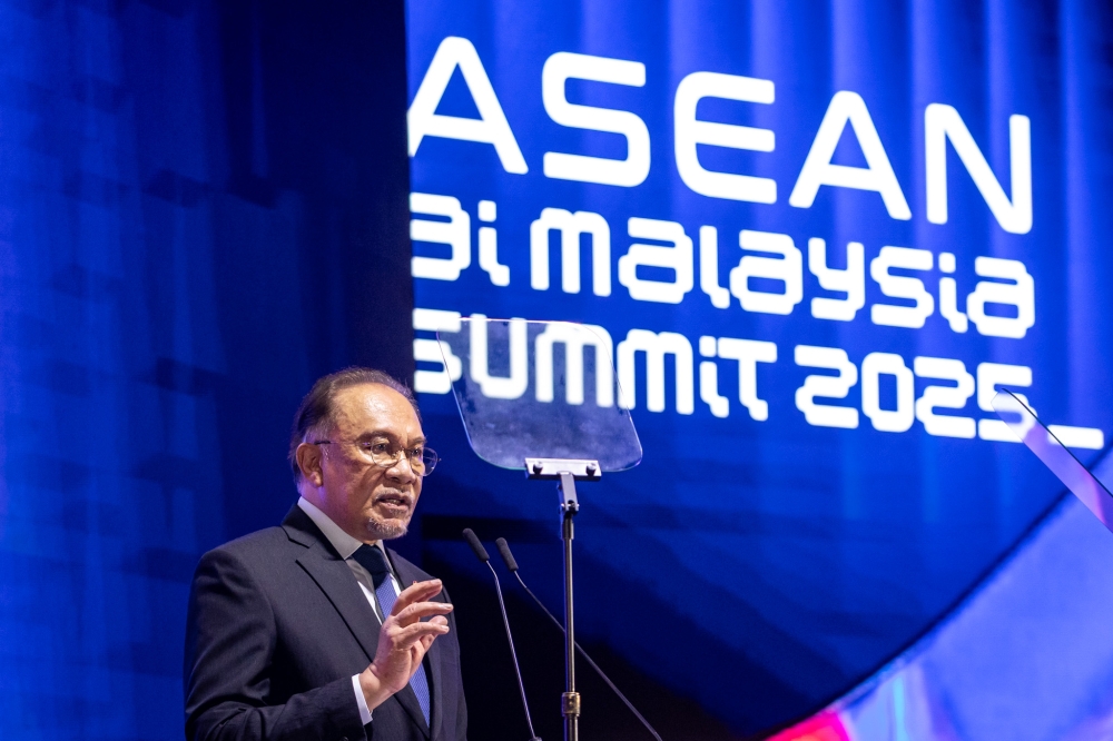 Prime Minister Datuk Seri Anwar Ibrahim speaks during the launch of the Asean AI Malaysia Summit 2025 (AAIMS 2025) at the Malaysia International Trade and Exhibition Centre (Mitec) in Kuala Lumpur August 12, 2025. — Picture by Firdaus Latif