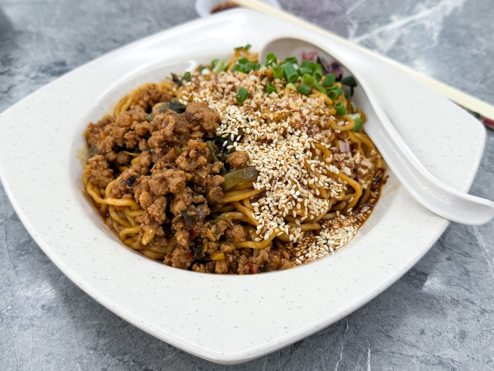 Punchier Yibin Burning Noodles highlights dry noodles given a boost of chilies. — Picture by Lee Khang Yi