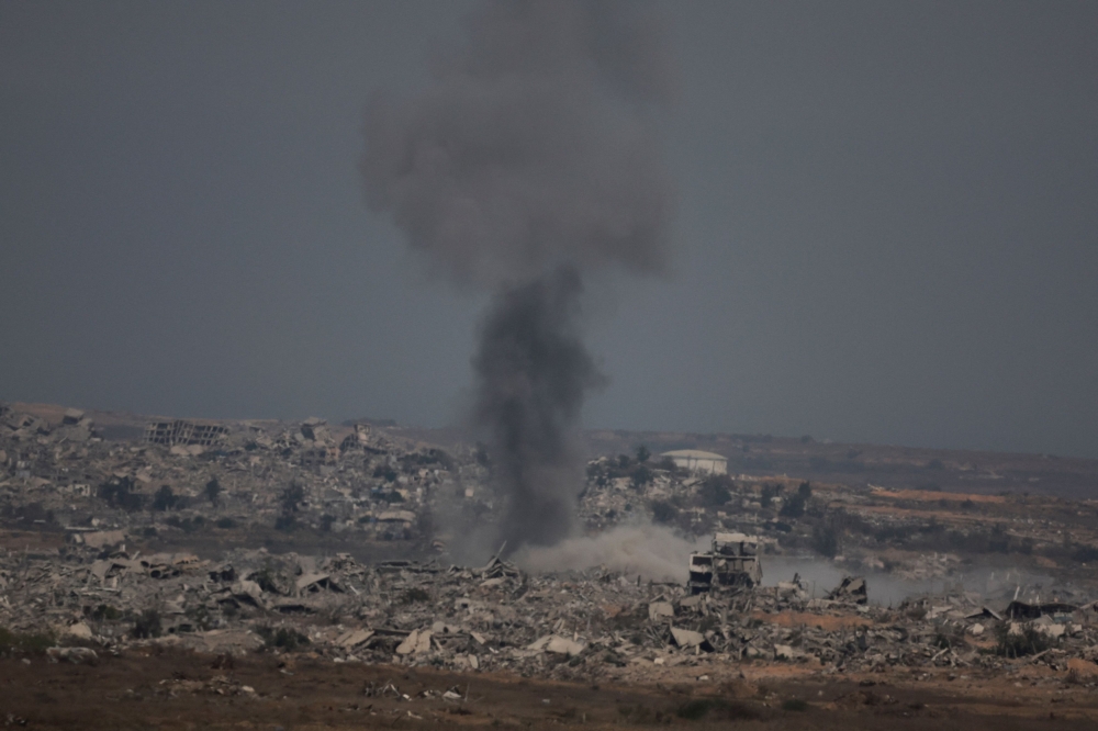 Smoke rises after an Israeli air strike in north Gaza, as seen from Israel's border with Gaza, Israel August 12, 2025. — Reuters pic 