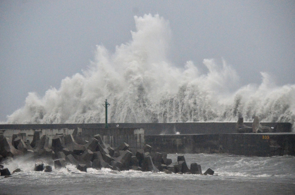 This picture taken and released by Taiwan’s Central News Agency (CNA) on August 13, 2025 shows waves generated by Typhoon Podul breaking along the coast in Taitung. — CNA handout pic via AFP 