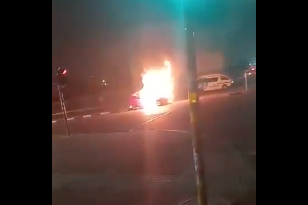 According to police, four men approached a ride-hailing vehicle outside a mall in the Soweto township, shot the driver and set the vehicle on fire. — Screengrab from X/Benzito