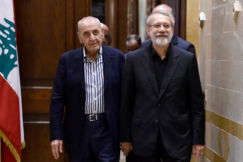 This handout photo released by the Lebanese Parliament press office shows Lebanon’s Parliament Speaker Nabih Berri receiving Iran’s Supreme National Security Council chief Ali Larijani in Beirut on August 13, 2025. — AFP pic 