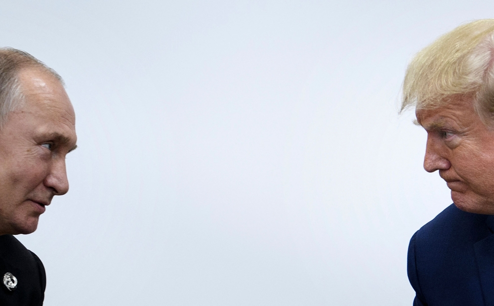 File picture of US President Donald Trump attending a meeting with Russia’s President Vladimir Putin during the G20 summit in Osaka on June 28, 2019. Trump has voiced admiration for Putin in the past and faced wide criticism after a 2018 summit in Helsinki where he appeared to accept the Russian’s denials of US intelligence on Moscow’s meddling in US elections. — AFP pic 