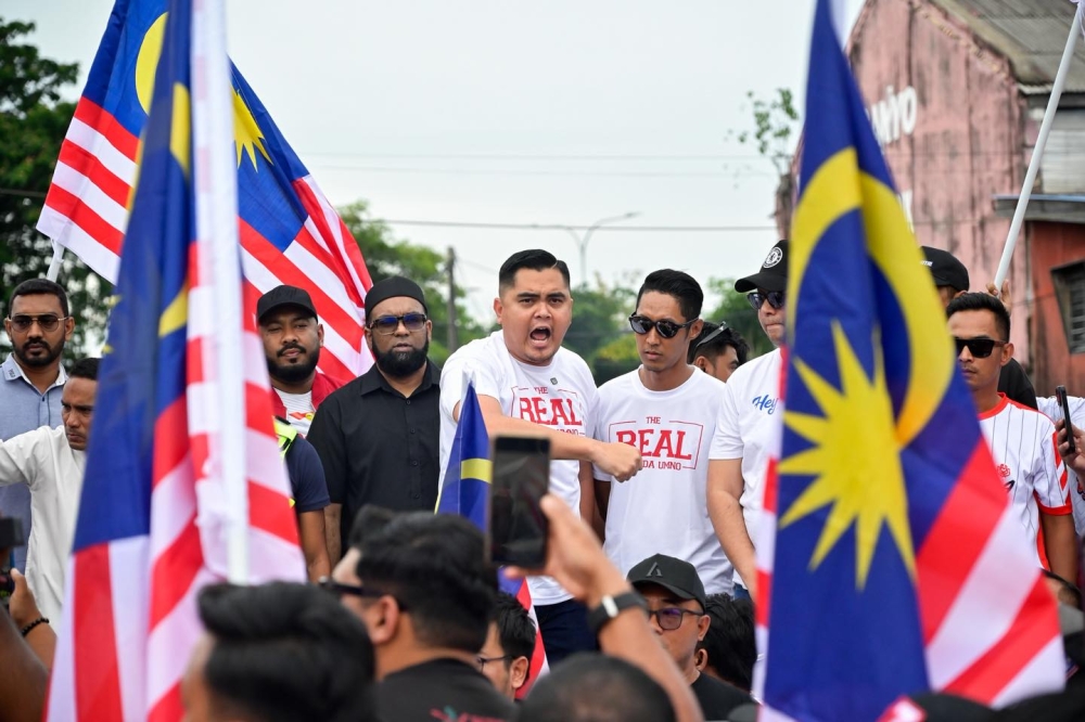 Umno Youth holding a protest in Kepala Batas over the upside-down Jalur Gemilang issue. — Picture from Facebook/Pemuda Umno