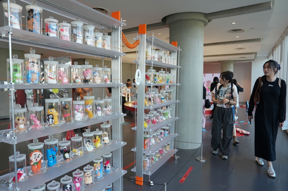 People visit the exhibition ‘Era of Uglies Has Arrived’ by Alibaba’s Taobao, in Hangzhou, Zhejiang province, China August 13, 2025. — Reuters pic