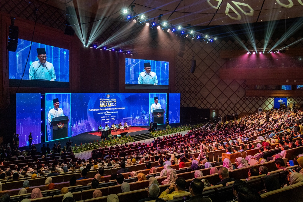 Prime Minister Datuk Seri Anwar Ibrahim speaks at the 20th Civil Service Premier Assembly (MAPPA XX) at Putrajaya International Convention Centre (PICC) in Putrajaya August 15, 2025. — Picture by Firdaus Latif