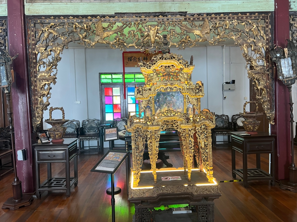 The gilded carved works showcased in the Lu Ban Master Memorial Hall. — Picture by Opalyn Mok