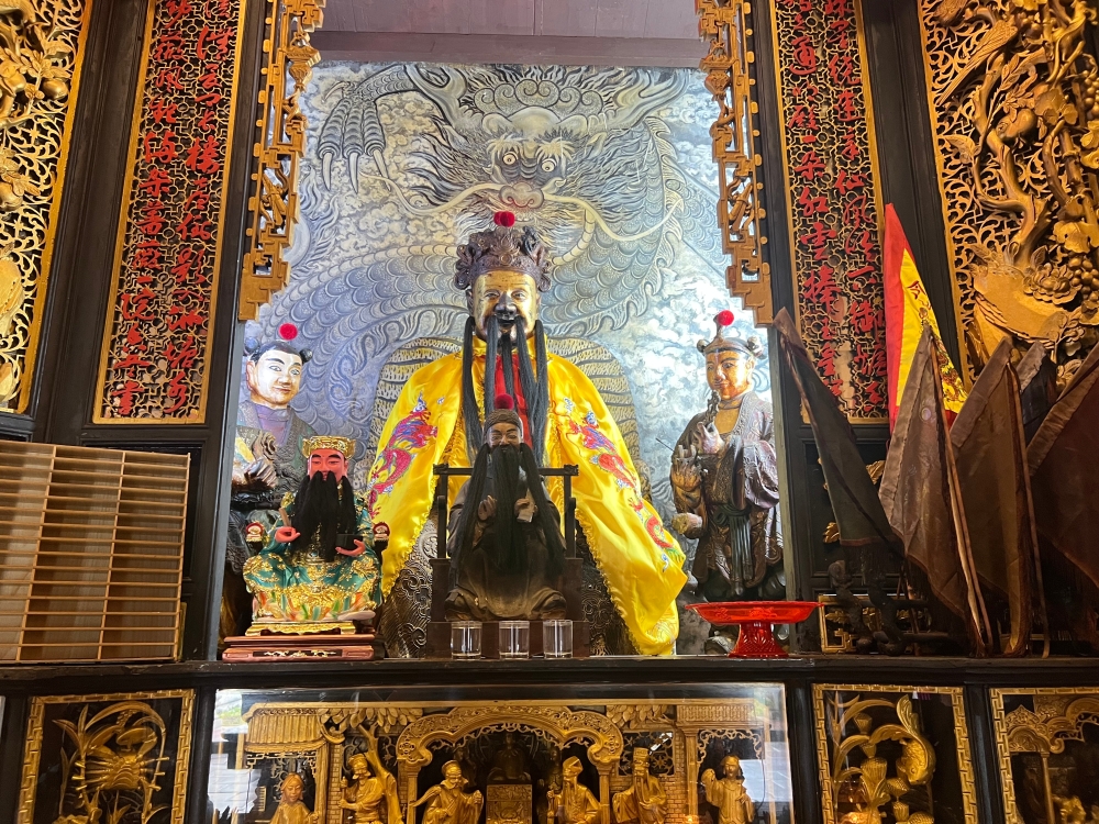 The patron saint of carpentry and contractors, Lo Pan dominates the main prayer at Loo Pun Hong. — Picture by Opalyn Mok