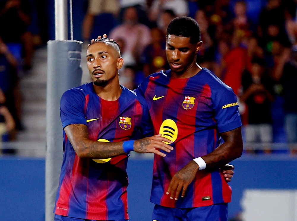 FC Barcelona’s Raphinha celebrates scoring their third goal with Marcus Rashford during the Joan Gamper Trophy friendly match against Como at Estadi Johan Cruyff, Barcelona August 10, 2025. — Reuters pic