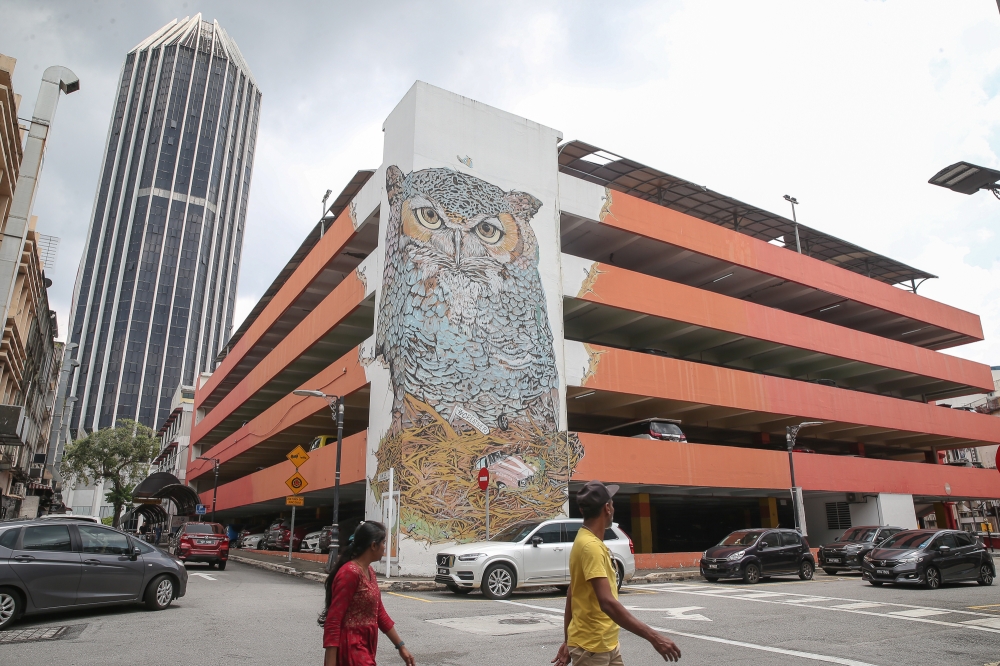 The five-storey tall giant owl mural near Menara MBPJ has served as a distinct navigational landmark for the locals since its inception. — Picture by Yusof Isa