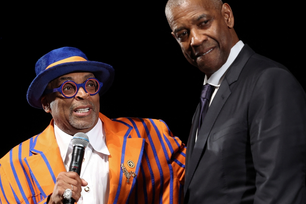 US actor Denzel Washington reacts before receiving the Honorary Palme d'Or from director Spike Lee at the screening of the film Highest 2 Lowest during the 78th Cannes Film Festival in Cannes, southern France, May 19, 2025. — Reuters file pic
