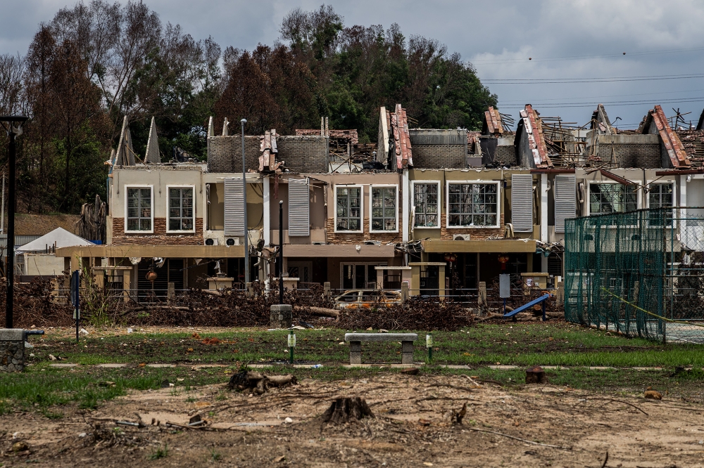 This file picture shows houses destroyed in the aftermath of the gas pipeline fire in Putra Heights, Subang Jaya, on April 30, 2025. — Picture by Firdaus Latif.