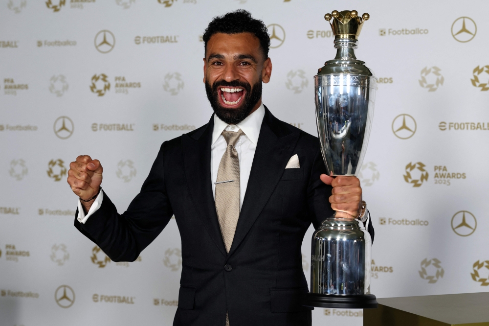 Liverpool’s Mohamed Salah poses with the PFA Players’ Player of the Year award during the 2024/25 Professional Footballers’ Association awards at the Opera House in Manchester, August 19, 2025. — AFP pic