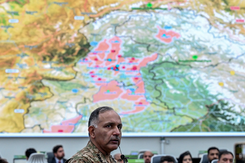 National Disaster Management Authority chairman Lieutenant General Inam Haider speaks at a media briefing on the ongoing monsoon disaster in Islamabad, August 17, 2025. More than 150 people are missing in northwest Pakistan after flash floods that have killed at least 344 nationwide, officials said. — AFP pic