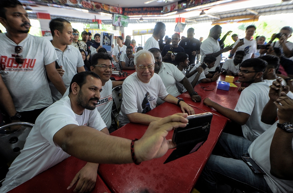 Prior to his conviction, Datuk Najib Razak was a popular figure associated with the 'Bossku' personality. — Picture by Shafwan Zaidon