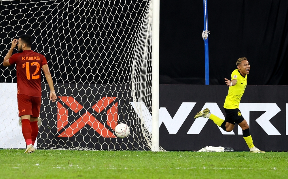 National team player Muhammad Faisal bin Abdul Halim (right) celebrates his goal in the first half of the first semi-final match of the AFF Mitsubishi Electric Cup 2022 between Malaysia and Thailand at the Bukit Jalil National Stadium in Kuala Lumpur January 7, 2023. — Bernama file pic