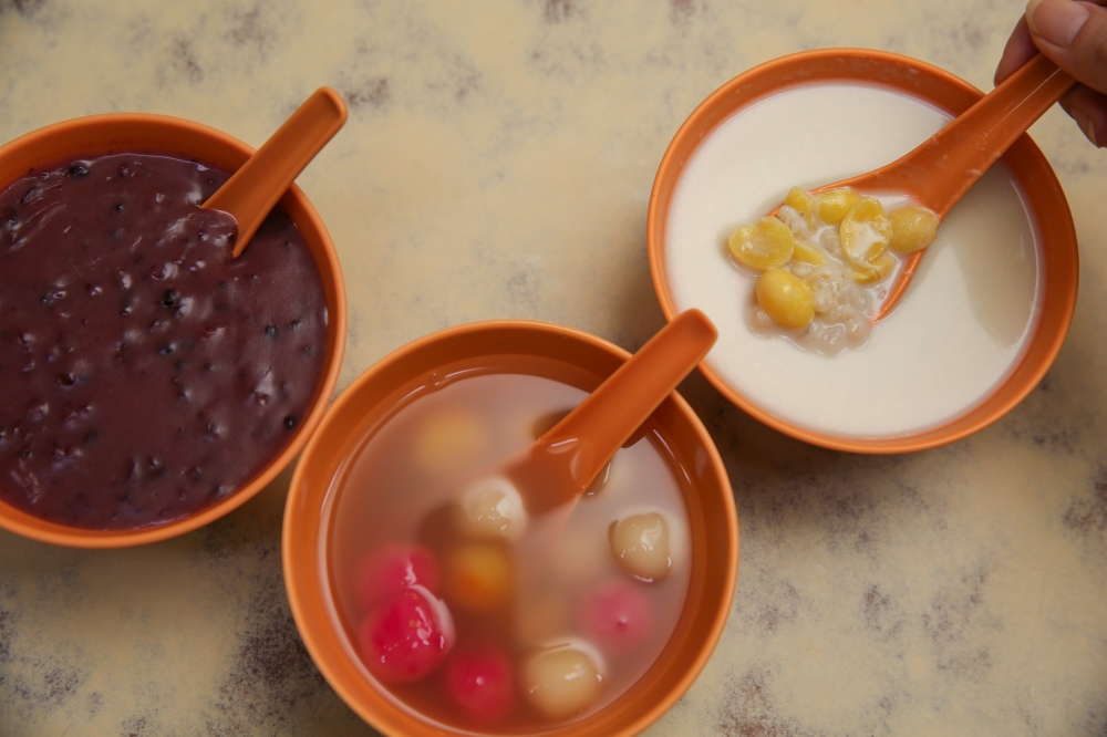 Classic ‘tong sui’ that have been on the menu for more than 50 years are the creamy, thick Black Glutinous Rice and robust flavoured Gingko Barley with the newly introduced Tang Yuan with a ginger pandan soup. — Picture by Choo Choy May