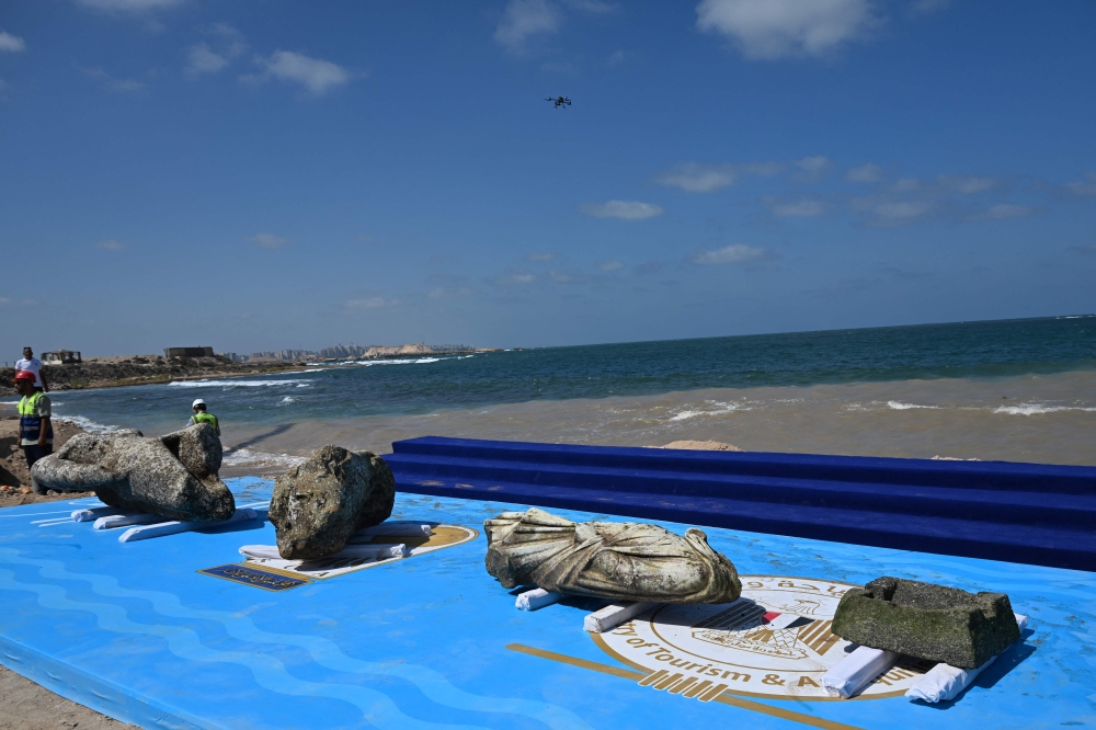 Recovered artifacts are displayed at Abu Qir bay in Alexandria on August 21, 2025, as part of an event organised by the Ministry of Tourism and Antiquities to recover sunken antiquities. — AFP pic 