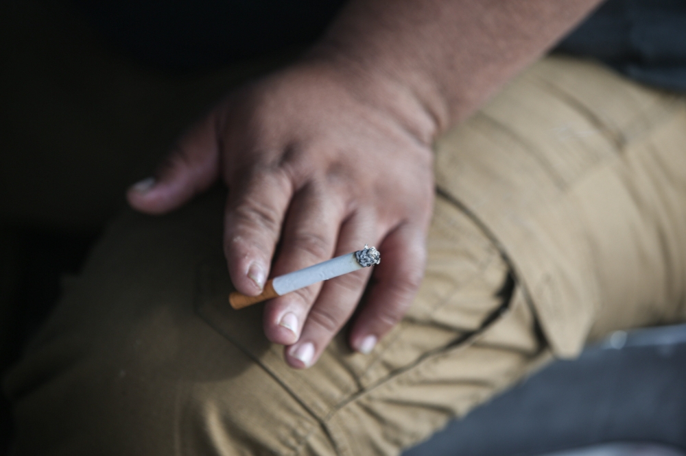 Four men were accused of possessing 20 brands of cigarettes amounting to a total of 5,262,280 sticks in Sandakan. — Picture by Farhan Najib