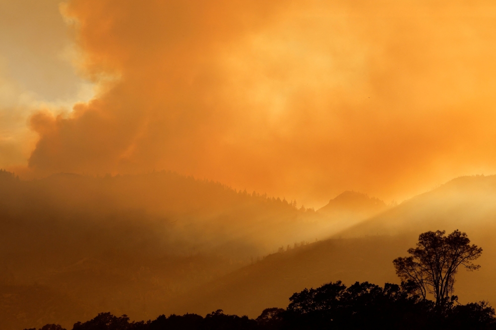 Smoke rises from the hills as the Pickett Fire burns, in Pope Valley, Napa County, California August 22, 2025. — Reuters pic