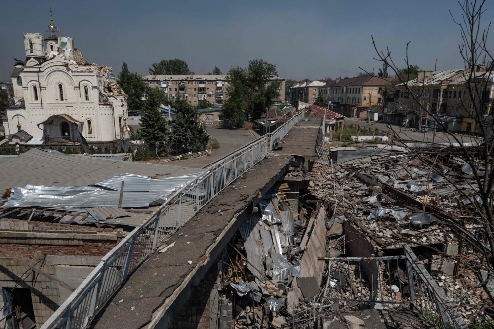 This handout photograph taken on July 30, 2025 and released on July 31, 2025 shows damaged residential buildings and a church in the frontline town of Kostyantynivka, Donetsk region. — AFP pic/Press service of the 93rd Kholodnyi Yar Separate Mechanized Brigade handout/Iryna Rybakova