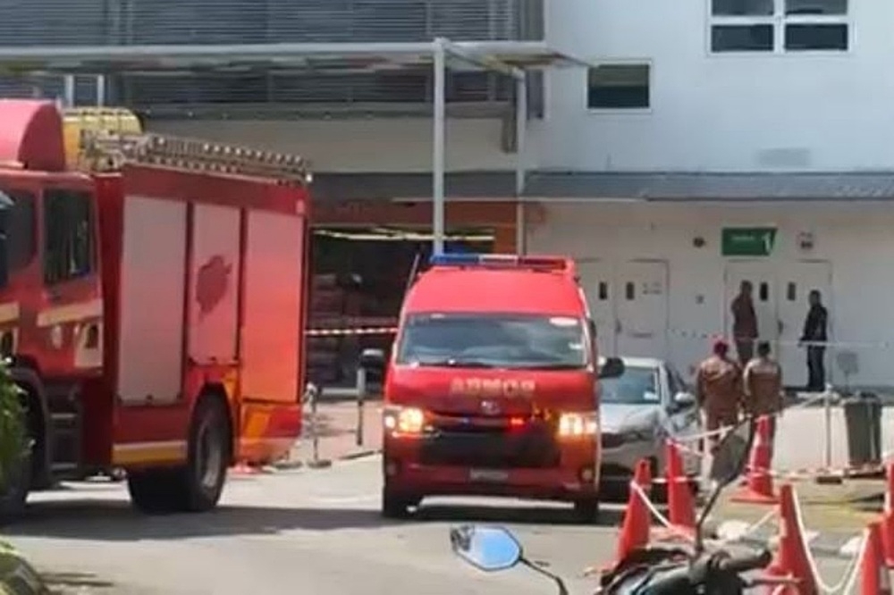 Bomba personnel at the scene at Sarawak General Hospital. — The Borneo Post pic